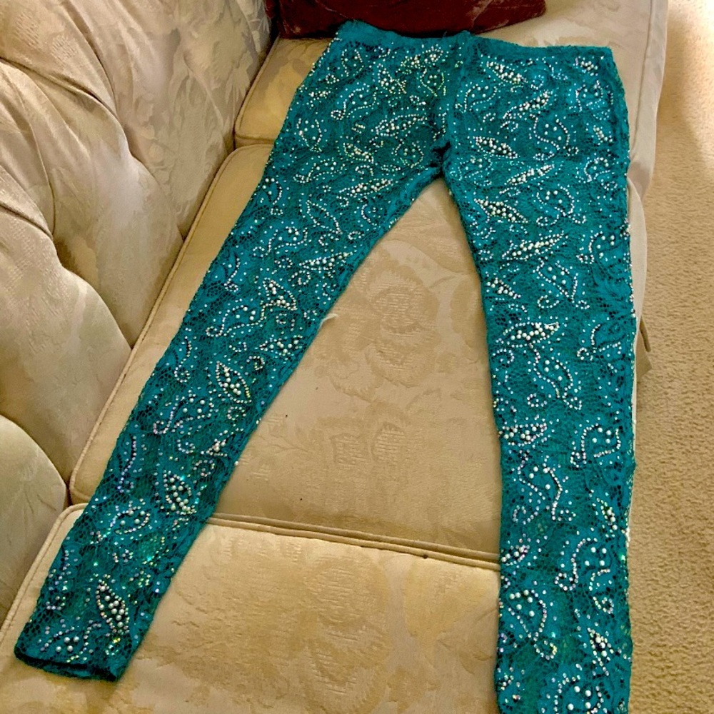Skinny precious stones and pearls lace pants, it’s a beautiful green. Size 2